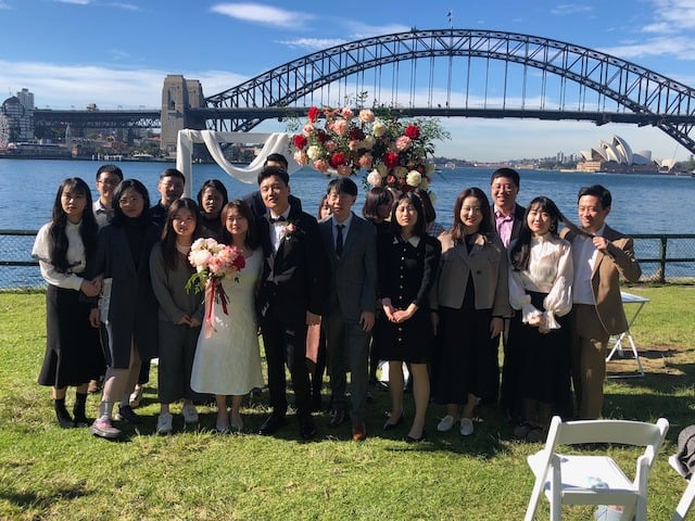 Chinese wedding ceremony at Blues Point Reserve with the Sydney Harbour Bridge and Opera House in the background