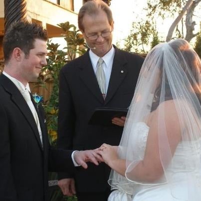 Bride placing a ring on the groom's finger during wedding at Loxley on Bellbird, Kurrajong Hills NSW